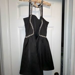 Never worn Black Mini dress. Great quality!